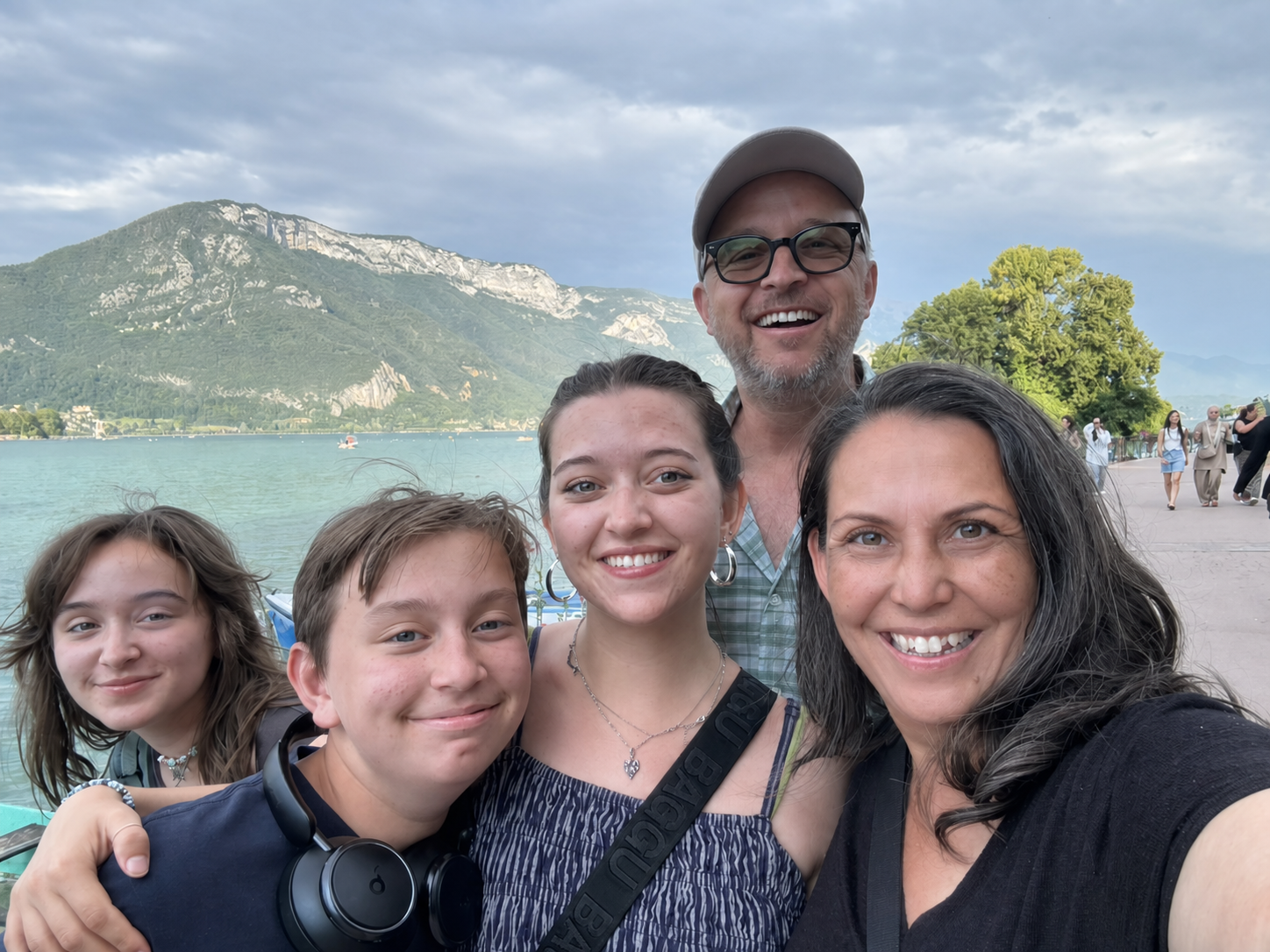 Justine Cook with her family of five by a lake in the French Alps